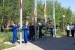 Gerst mit Flagge in Baikonur